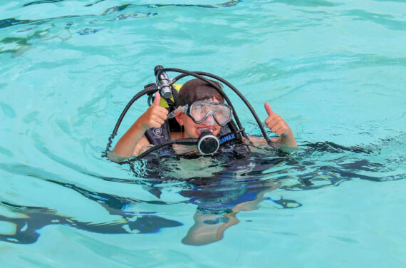 A camper scuba diving.
